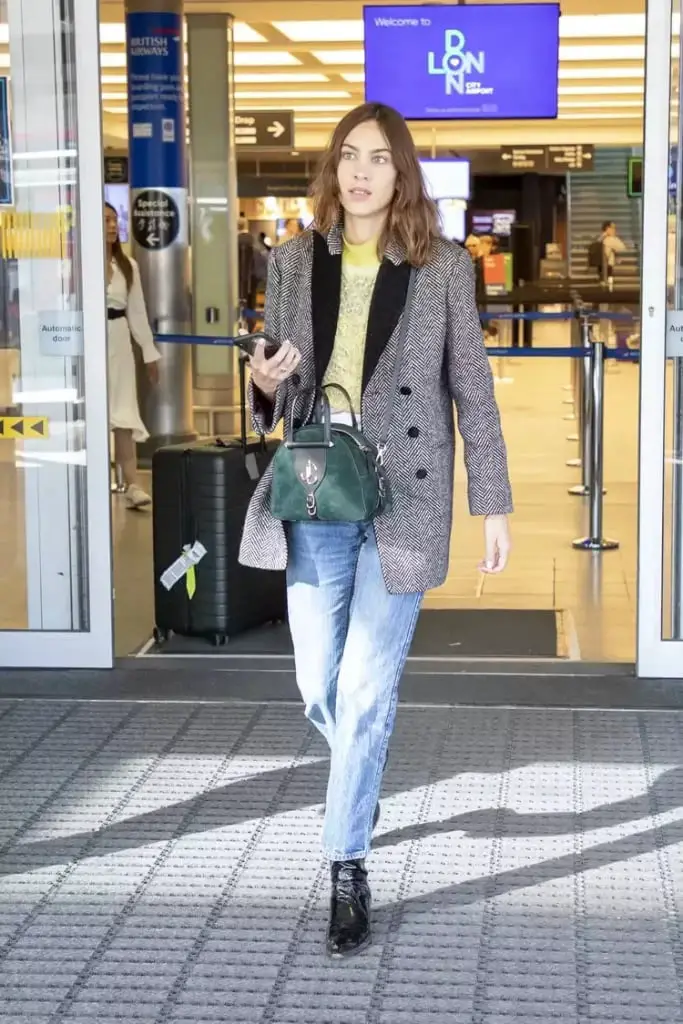 Herringbone Blazer and Yellow Knit Top for a Chic Airport Look Herringbone Blazer and Yellow Knit Top for a Chic Airport Look — Trendy Airport Outfits