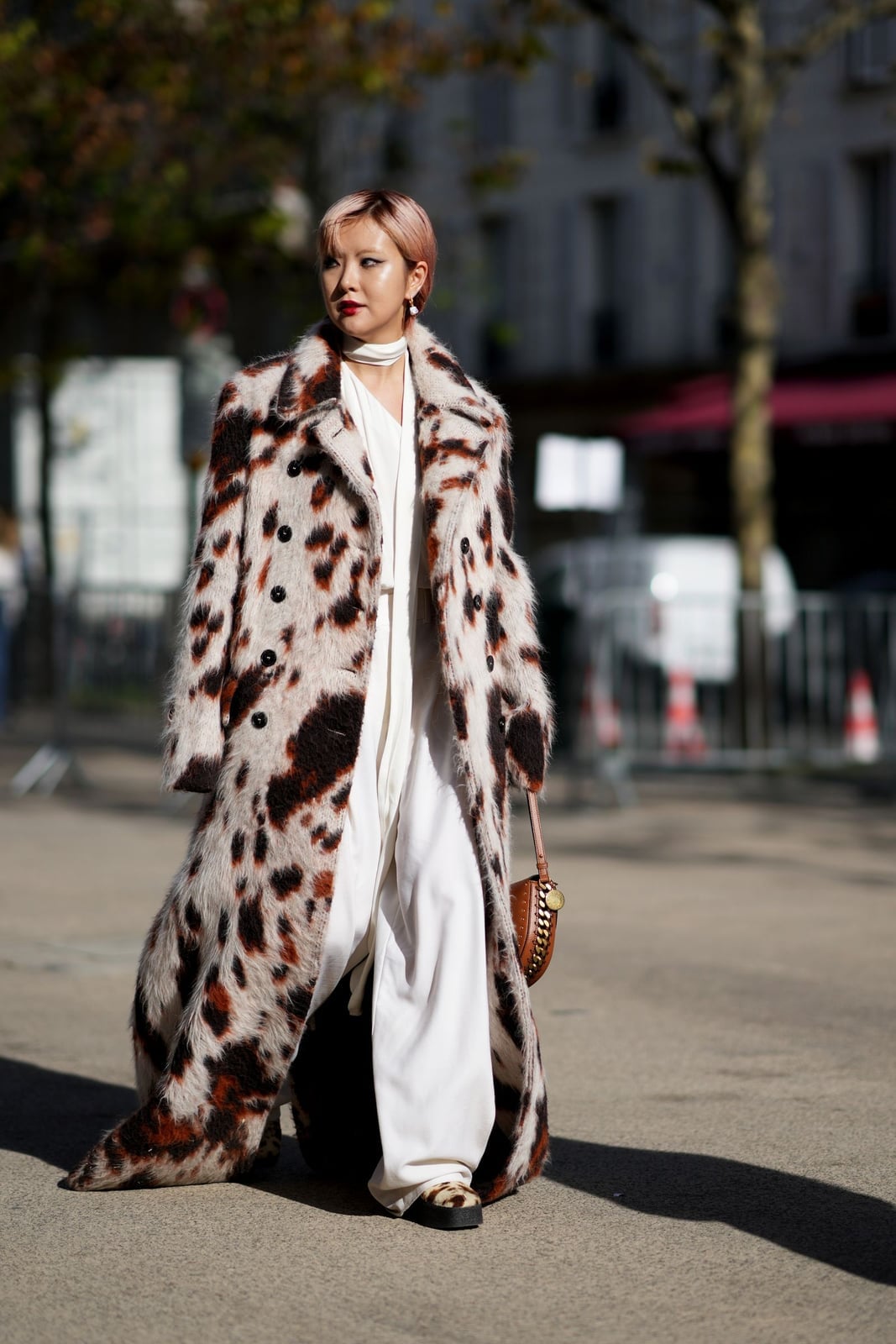 Cow Print Faux Fur Coat Over White Jumpsuit Cow Print Faux Fur Coat Over White Jumpsuit — Trendy Animal Print Outfits