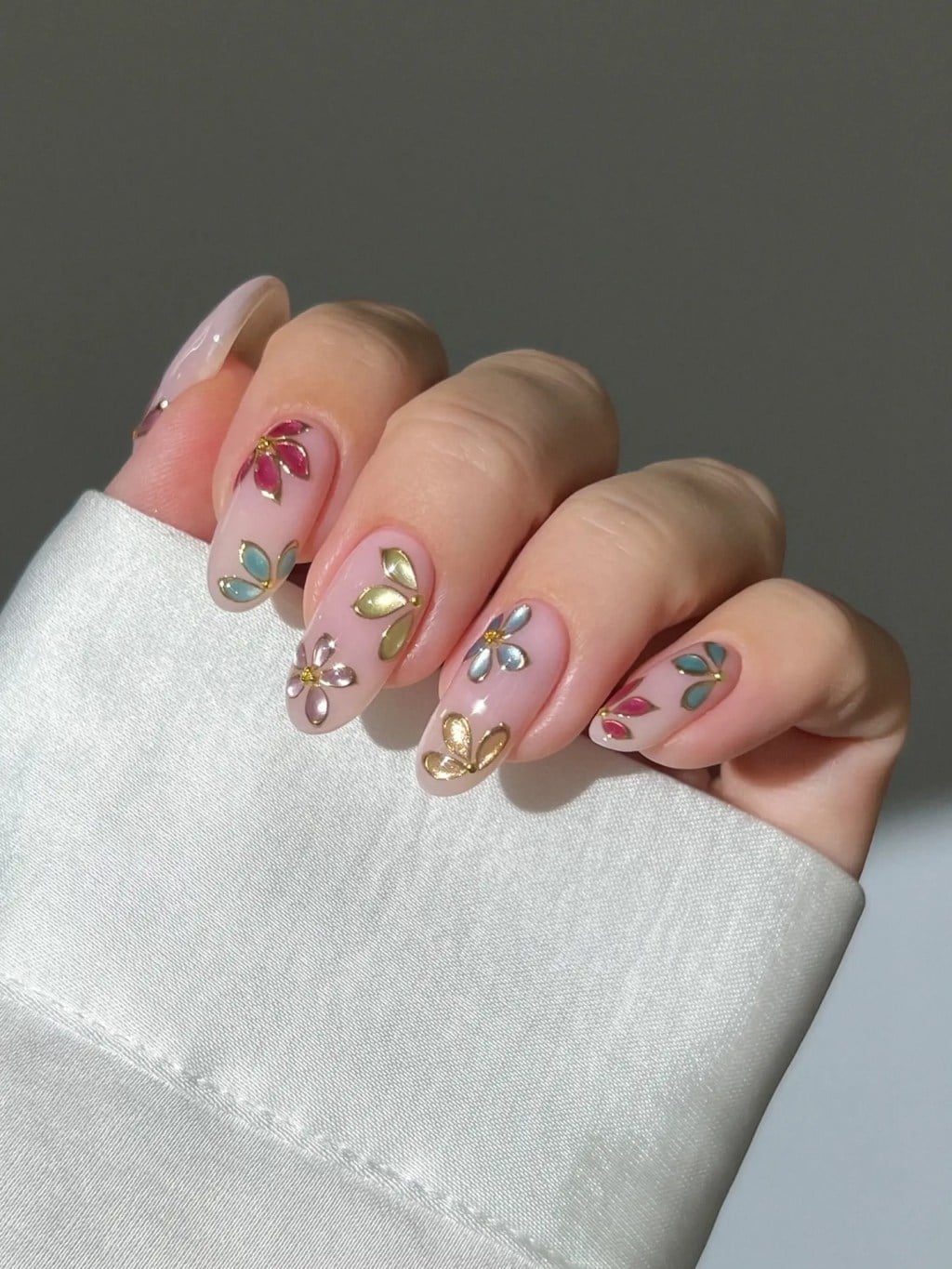 Nude Metallic Floral Charm Almond Nails — Trendy Birthday Nails Almond