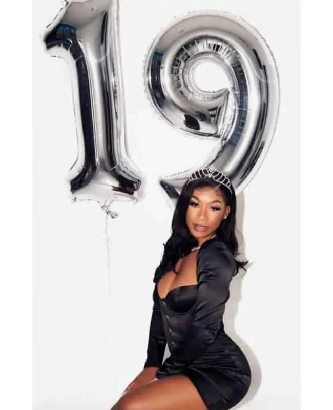 Fitted Black Satin Mini Dress with Tiara, Close-Up Take Fitted Black Satin Mini Dress with Tiara, Close-Up Take — Trendy Birthday Outfits Black Women