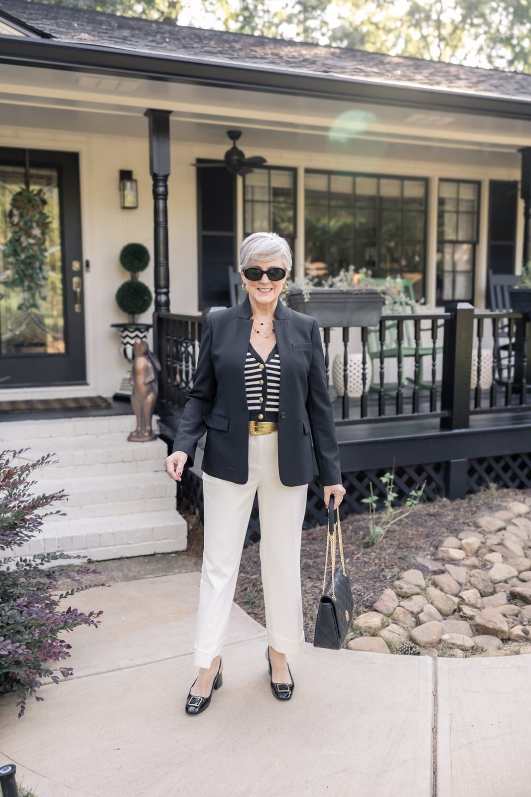 Black Blazer with Striped Top and White Trousers, Close-Up Take — Trendy Black and White Outfits