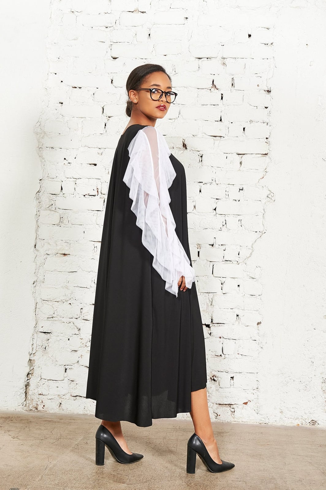 Black Dress with Sheer Ruffled Sleeves and Smooth Fabric — Trendy Black and White Outfits