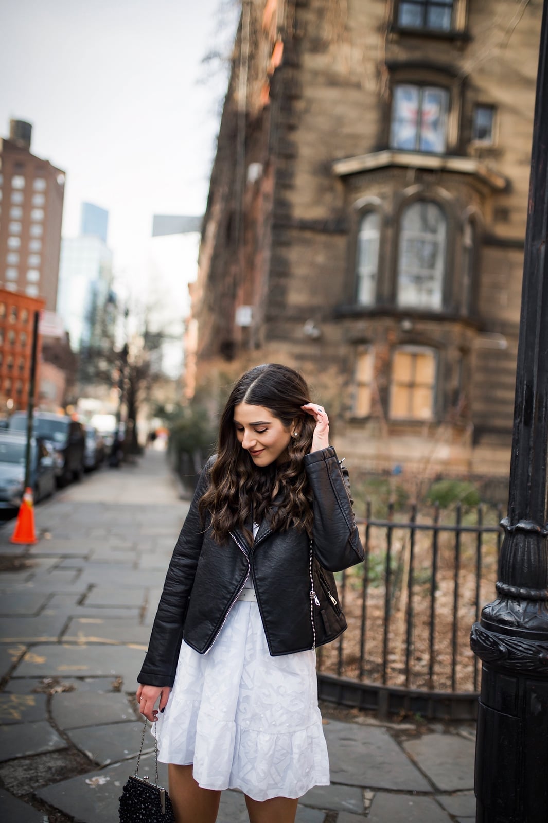 Leather Jacket Over Fit-And-Flare Dress — Trendy Black and White Outfits