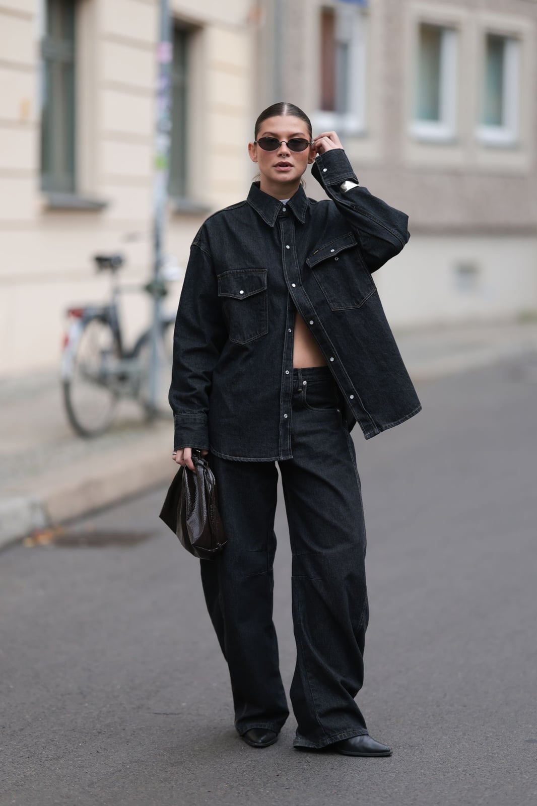 Black Baggy Jeans with an Unbuttoned Oversized Denim Shirt Black Baggy Jeans with an Unbuttoned Oversized Denim Shirt — Trendy Black Baggy Jeans Outfit