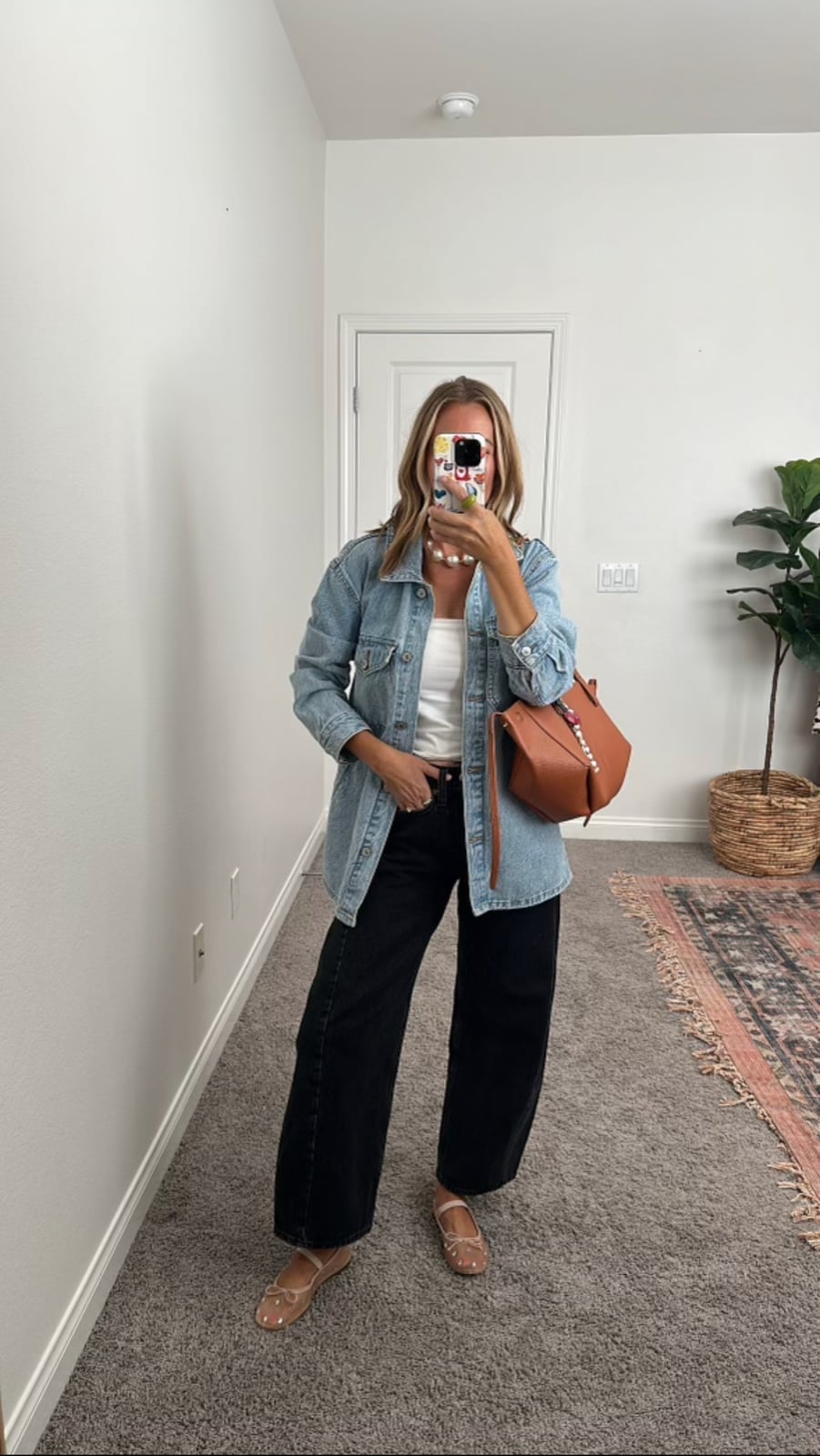 Denim Jacket Over White Tank with Black Barrel Jeans Denim Jacket Over White Tank with Black Barrel Jeans — Trendy Black Barrel Jeans Outfit