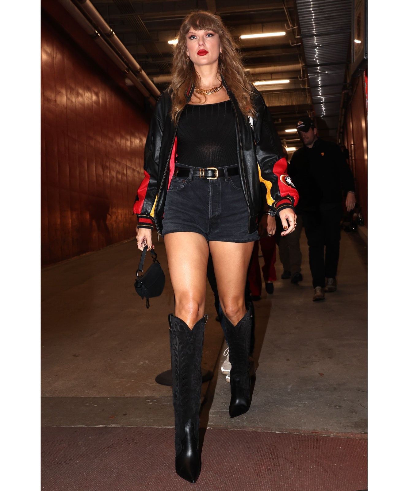 Black Cowboy Boots with Shorts and a Bomber Jacket Black Cowboy Boots with Shorts and a Bomber Jacket — Trendy Black Cowboy Boots Outfit