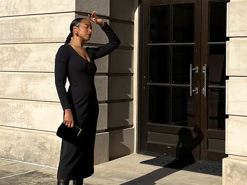 Fitted Black Maxi Dress with Long Sleeves and Boots — Trendy Black Dress Outfits