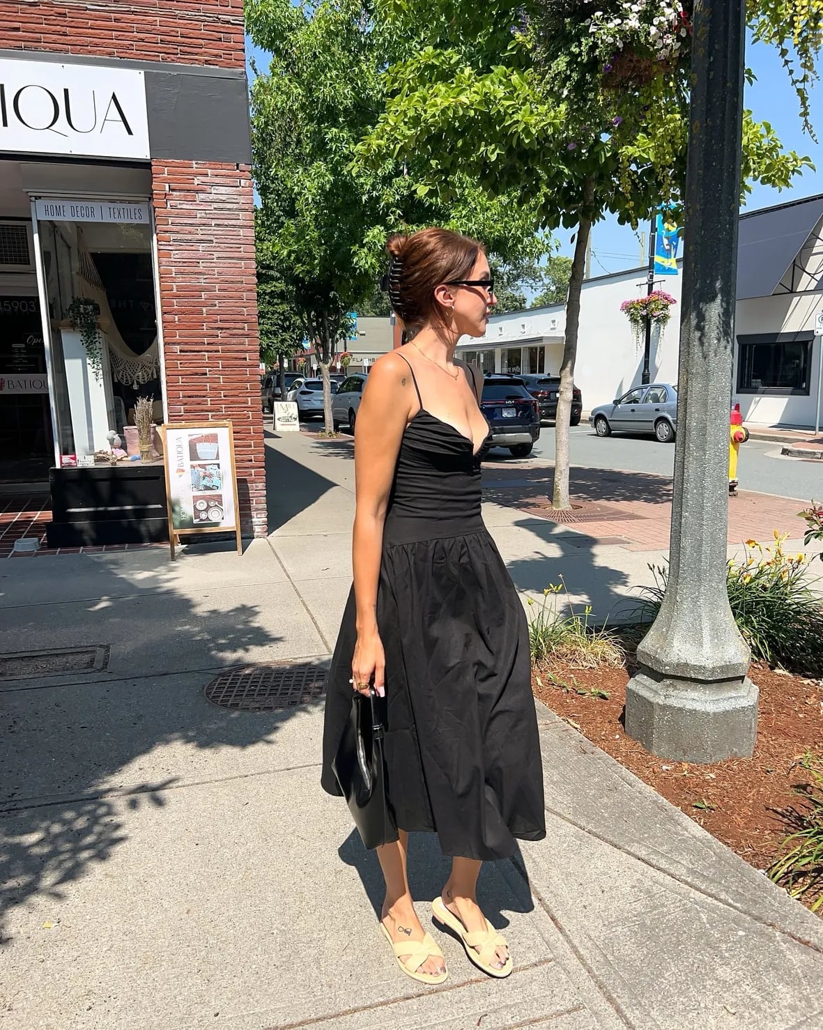 Black Fit and Flare Midi Dress with Beige Sandals — Trendy Black Dress Outfits