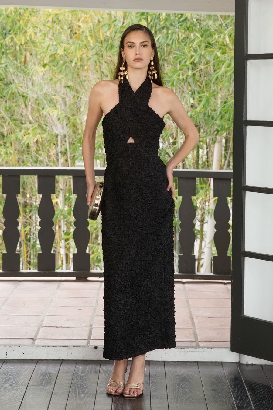 Halter Neck Dress with Criss-Cross Neckline and Gold Accessories — Trendy Black Dress Outfits