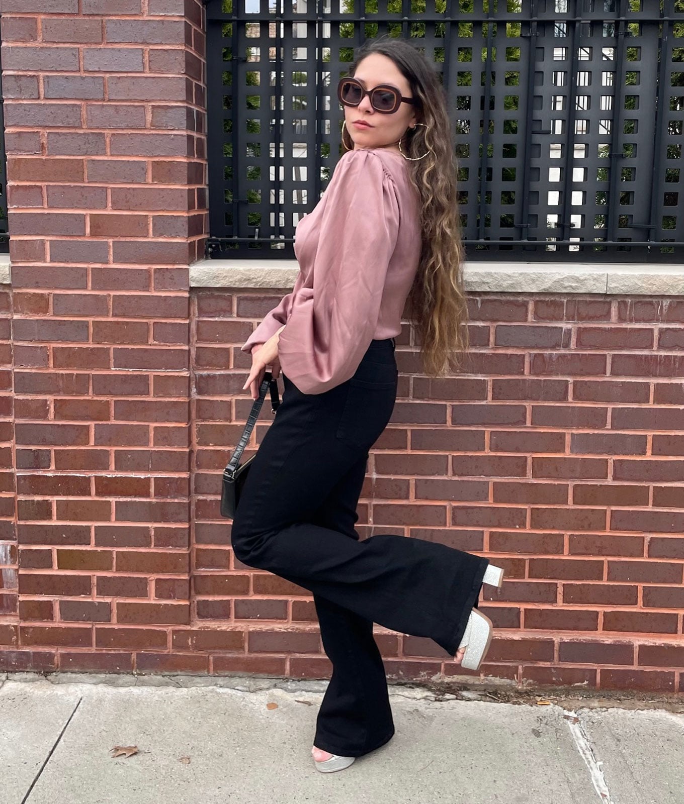 Black Flare Jeans with Pink Satin Blouse — Trendy Black Flare Jeans Outfit