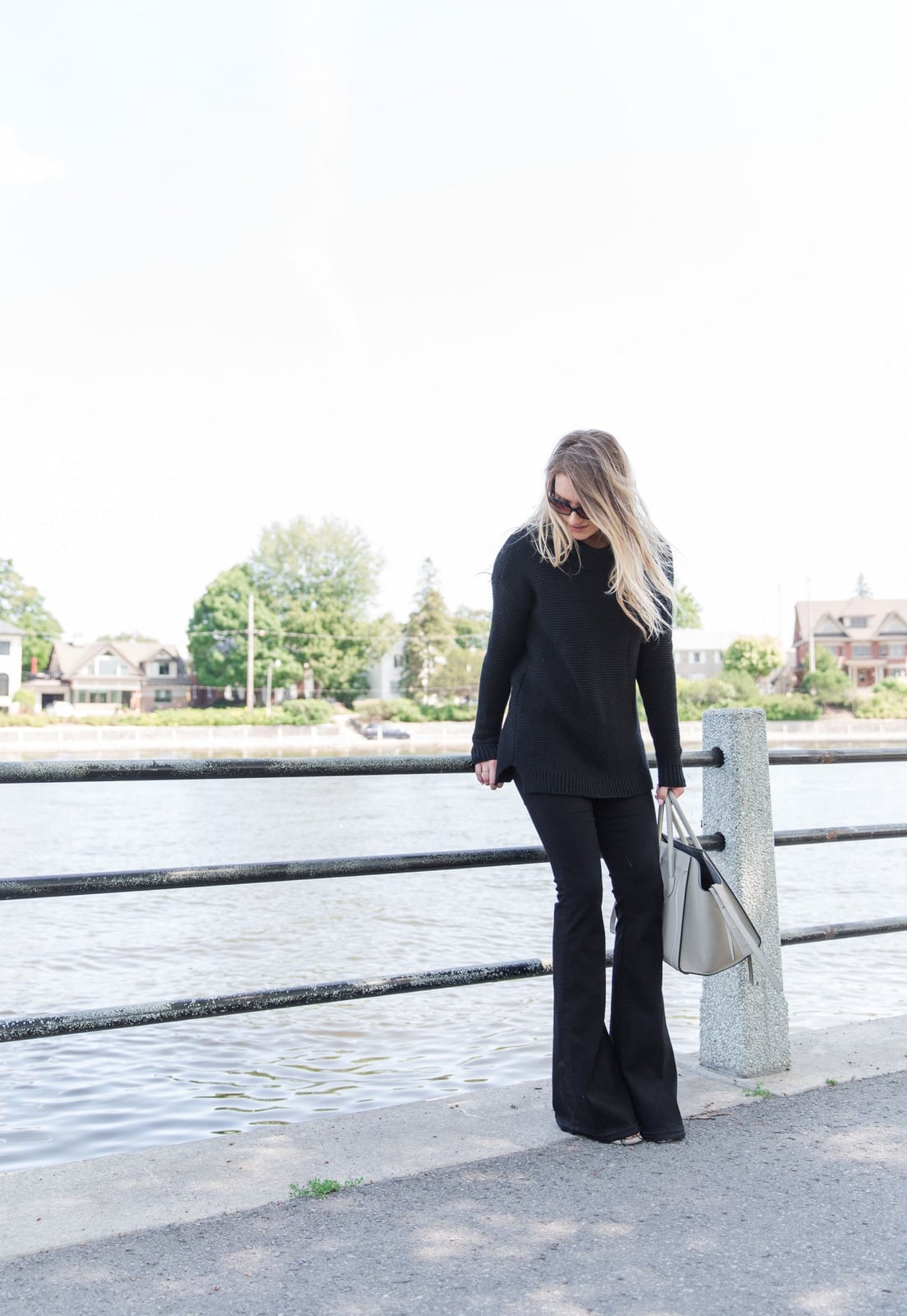 Black Flare Jeans with Knit Sweater and Flats — Trendy Black Flare Jeans Outfit