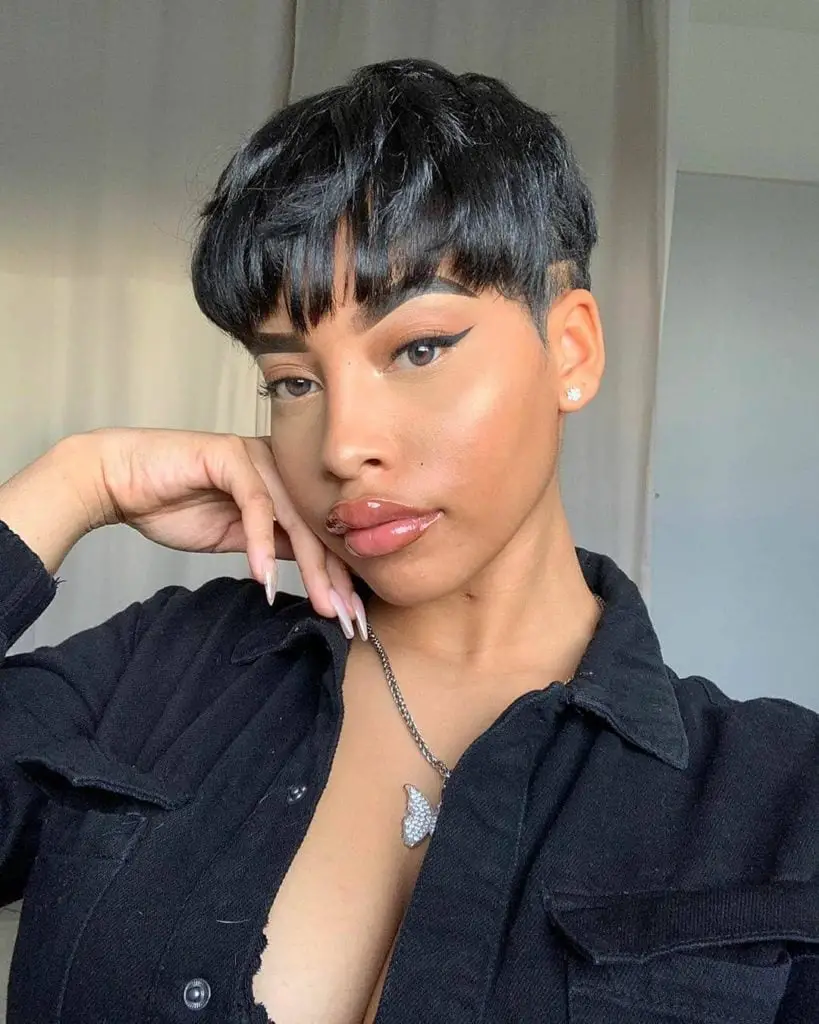 Textured Black Pixie With Short Bangs Textured Black Pixie With Short Bangs — Trendy Black Hair