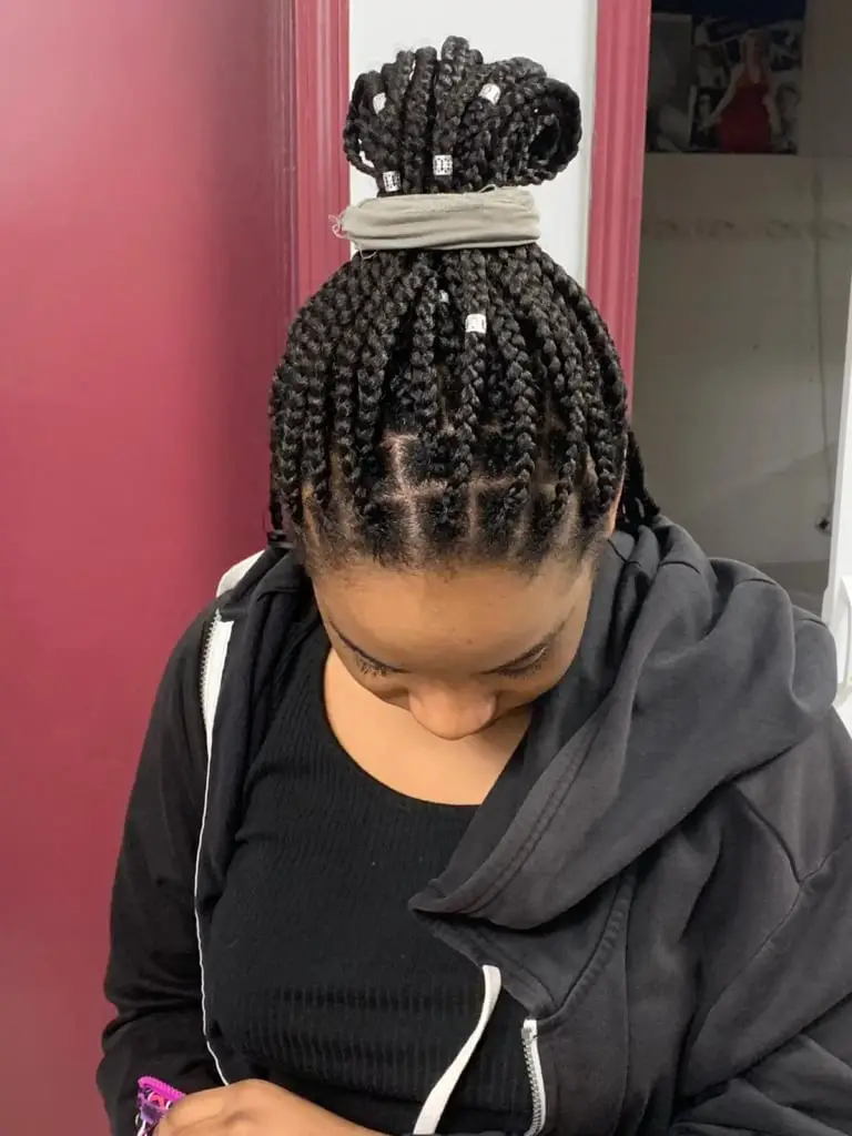 Thick Coily Hair In Intricate Braided Bun Thick Coily Hair In Intricate Braided Bun — Trendy Black Hair