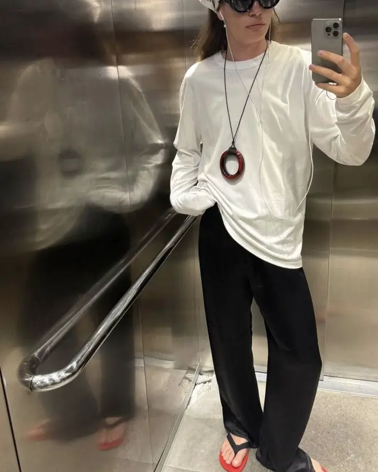 Black Wide Leg Trousers with Red Flip Flops — Trendy Black Trousers Outfit