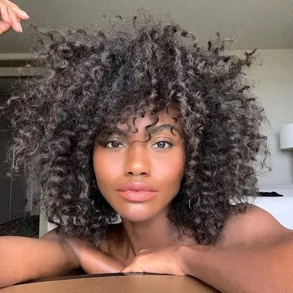 Collarbone Layers With Voluminous Curls Collarbone Layers With Voluminous Curls — Trendy Black Wig