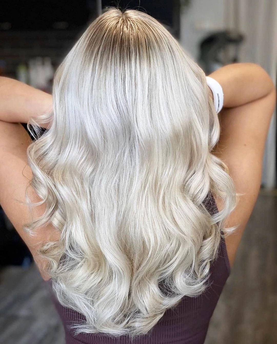 White Blonde With Subtle Highlights and Curtain Bangs — Trendy Blonde Highlights Hair