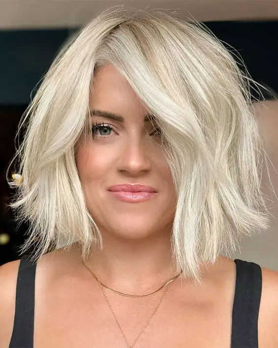 Textured Platinum Blonde Curly Pixie Textured Platinum Blonde Curly Pixie — Trendy Blonde Short Hair
