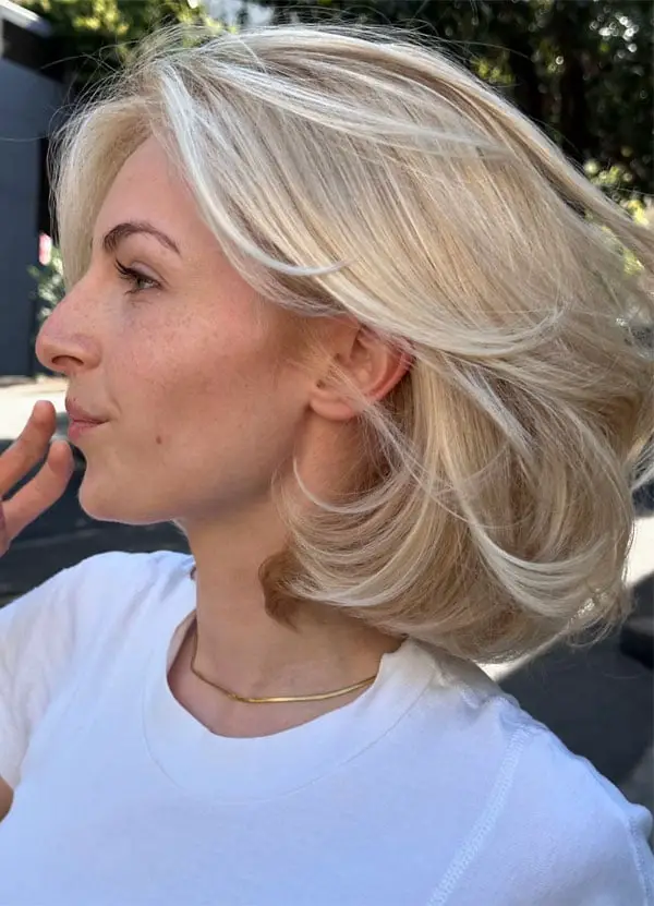 Platinum Blonde Layered Bob With Volume Platinum Blonde Layered Bob With Volume — Trendy Blonde Short Hair