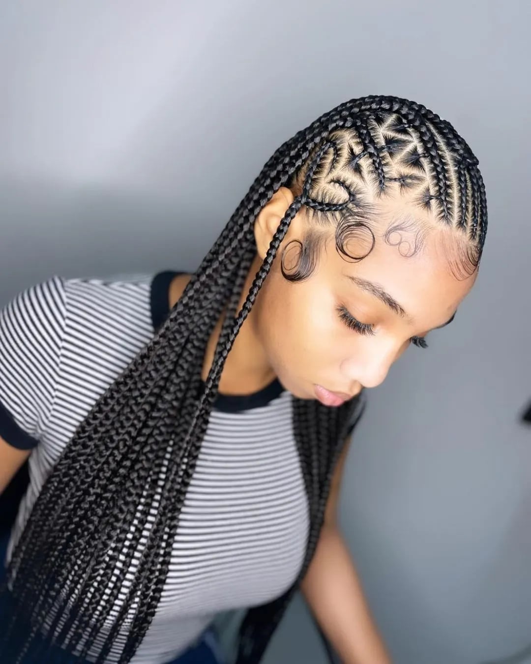 Precise Black Cornrow Lines Precise Black Cornrow Lines — Trendy Braids to the Back