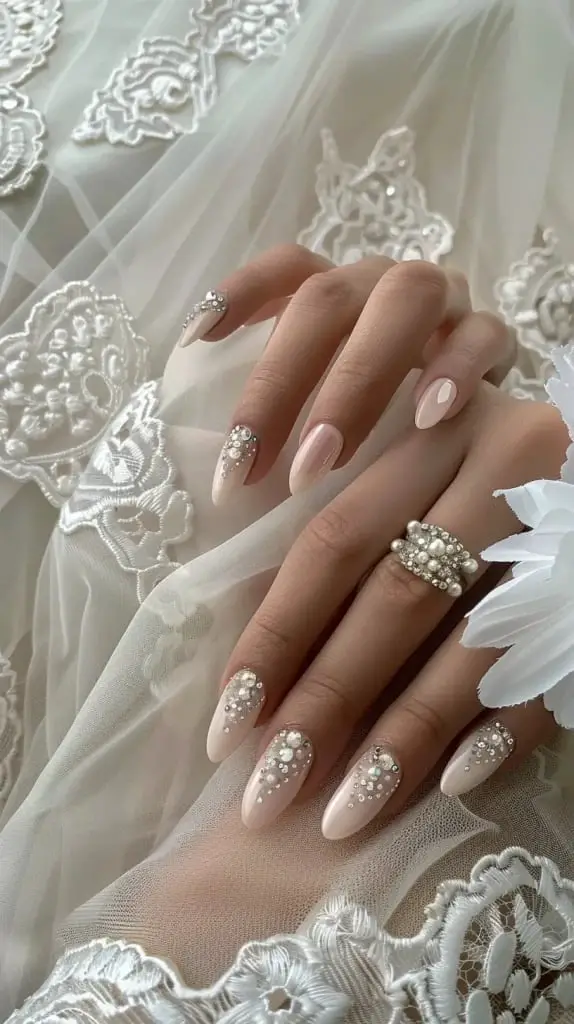 Short Almond Milky Pink Pearl Rhinestone Nails Short Almond Milky Pink Pearl Rhinestone Nails — Trendy Bridal Nails