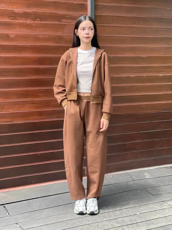 Brown Zip-Up Hoodie Over Striped T-Shirt with Wide-Leg Pants Brown Zip-Up Hoodie Over Striped T-Shirt with Wide-Leg Pants — Trendy Brown Hoodie Outfit