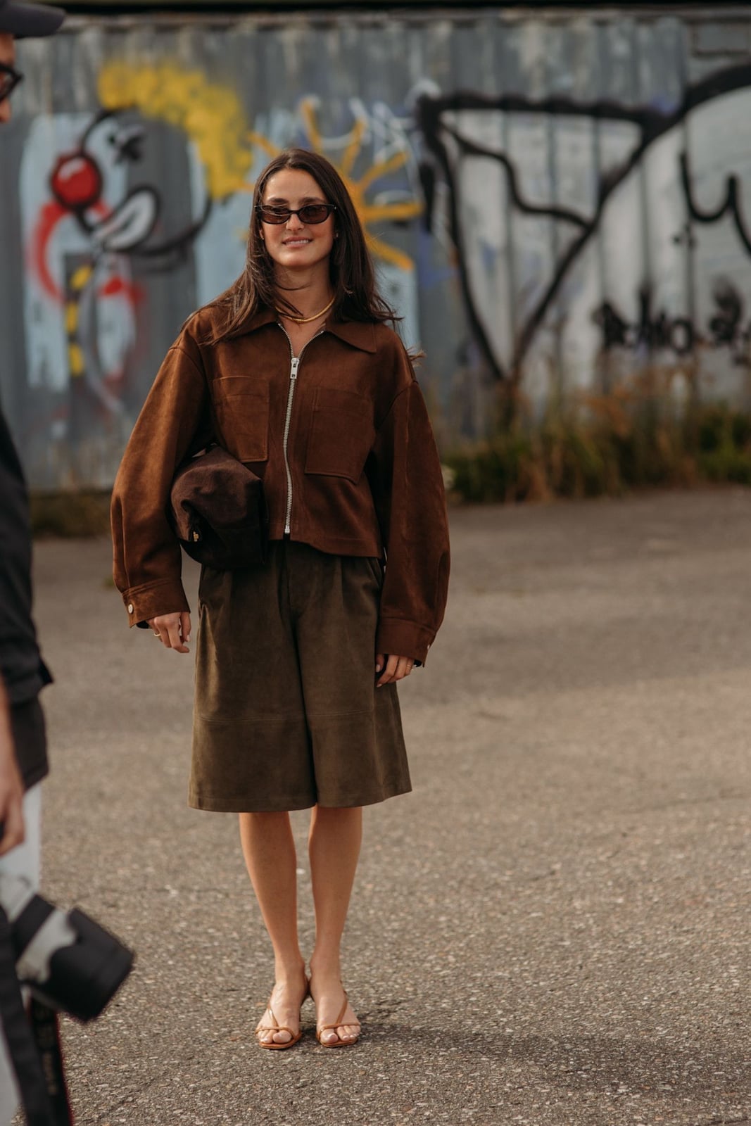 Oversized Brown Suede Jacket with Olive Green Shorts — Trendy Brown Jacket Outfit