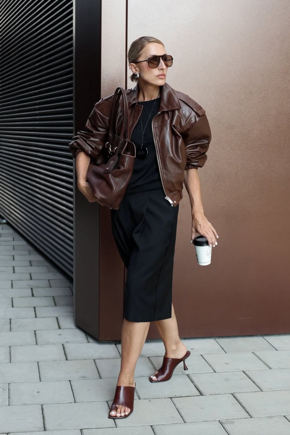 Oversized Leather Jacket Over a Black Midi Skirt — Trendy Brown Jacket Outfit