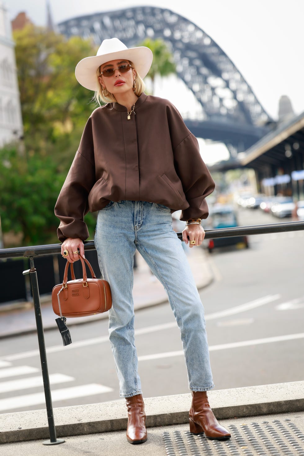 Oversized Brown Bomber Jacket with Straight Leg Jeans — Trendy Brown Outfits