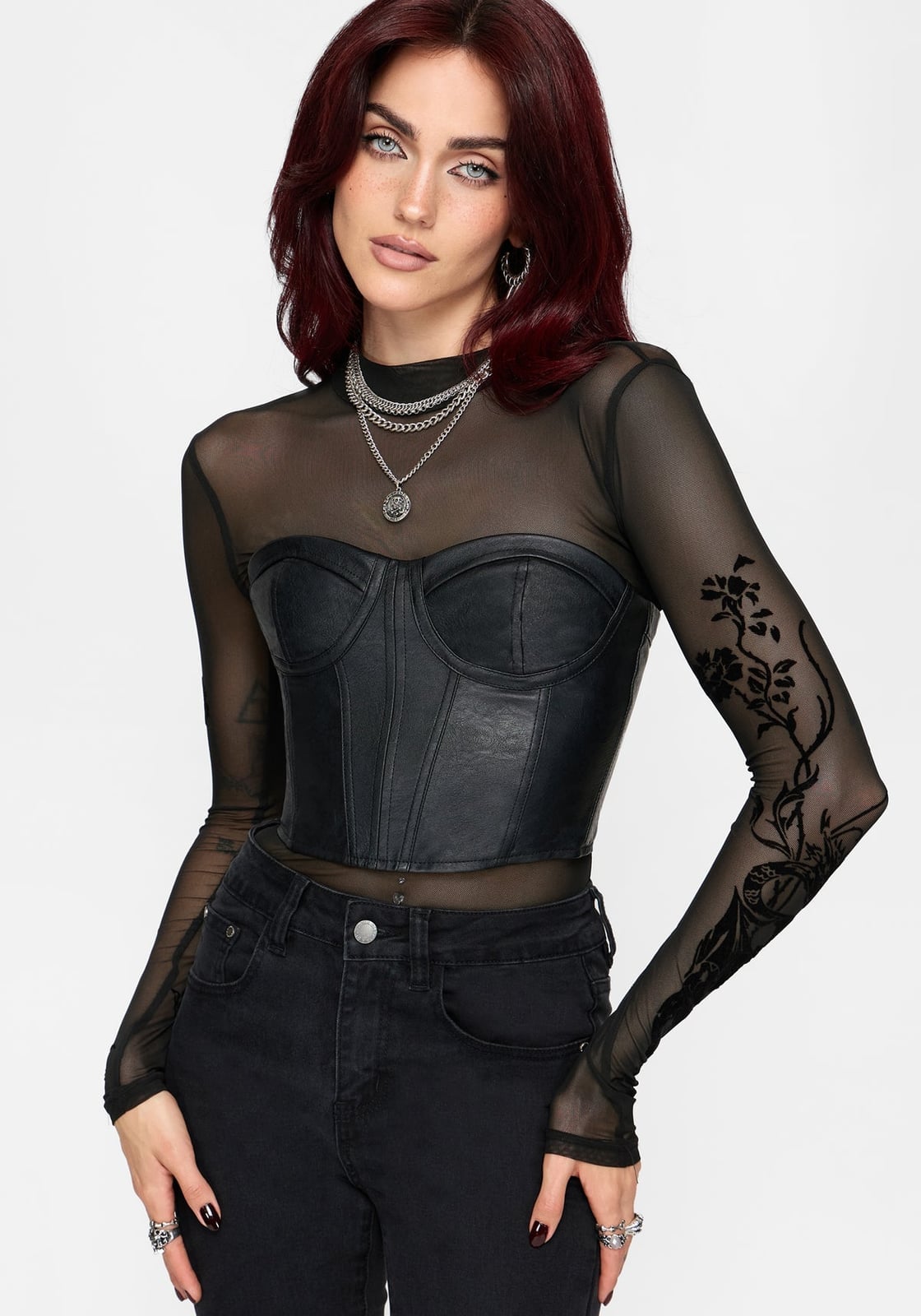 Leather Corset Over Floral Mesh Top With Layered Silver Necklaces — Trendy Corset Outfits