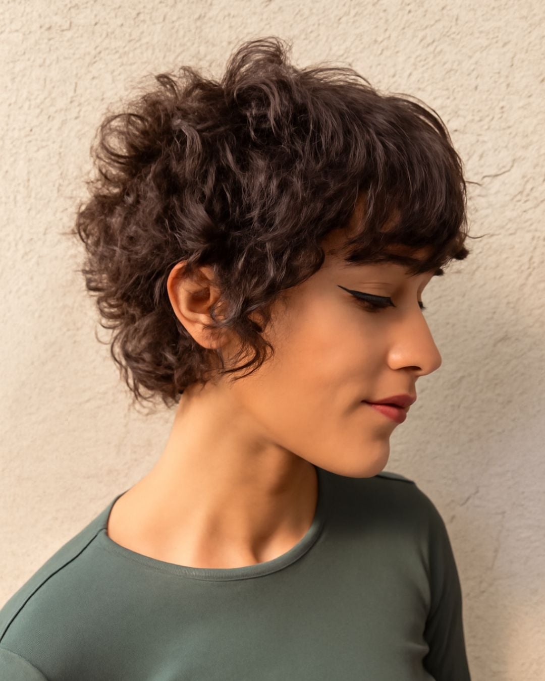 Textured Dark Brown Pixie With Swept Fringe Textured Dark Brown Pixie With Swept Fringe — Trendy Curly Hair