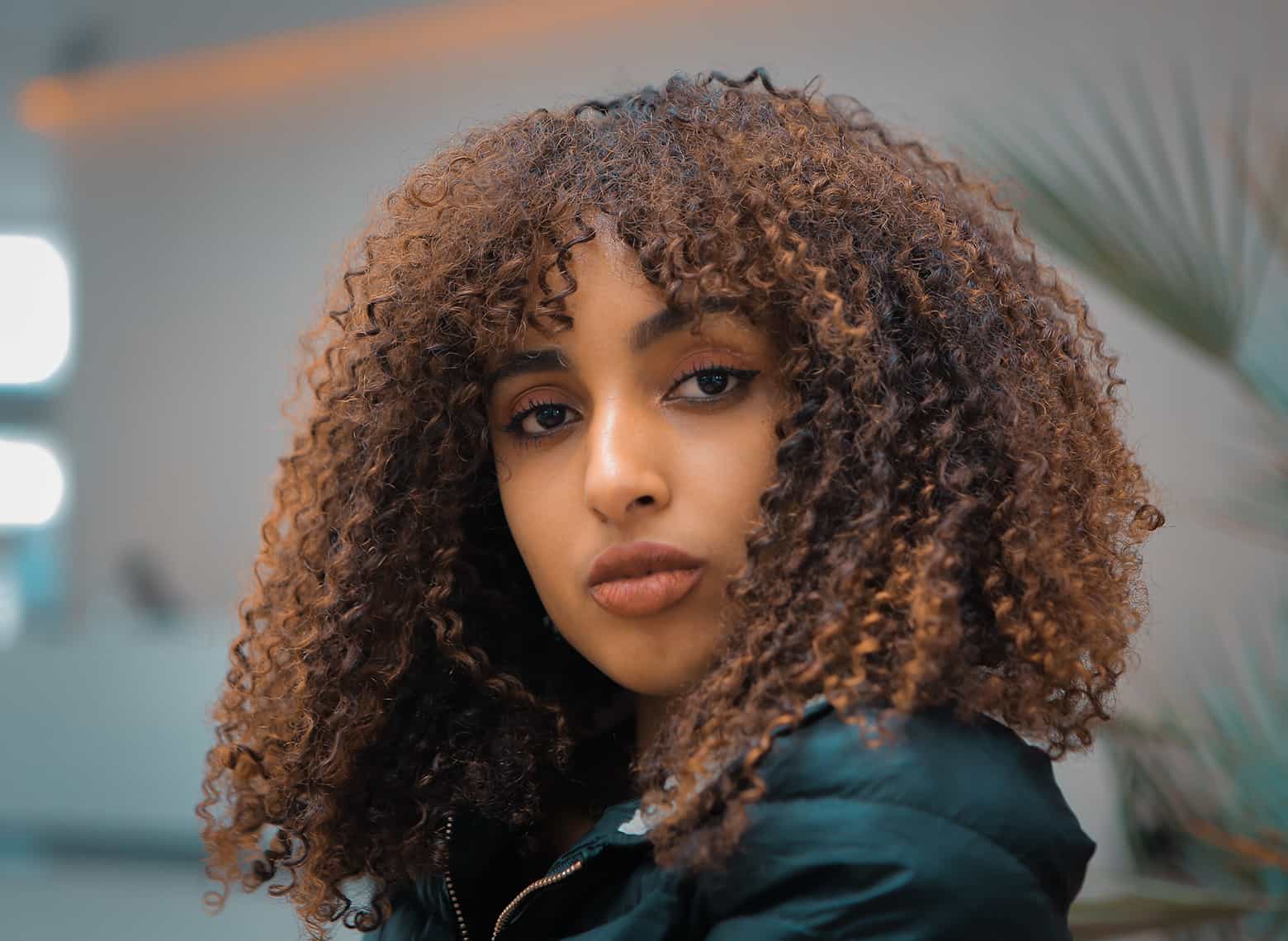 Collarbone Medium Brown With Caramel Highlights — Trendy Curly Hair Color