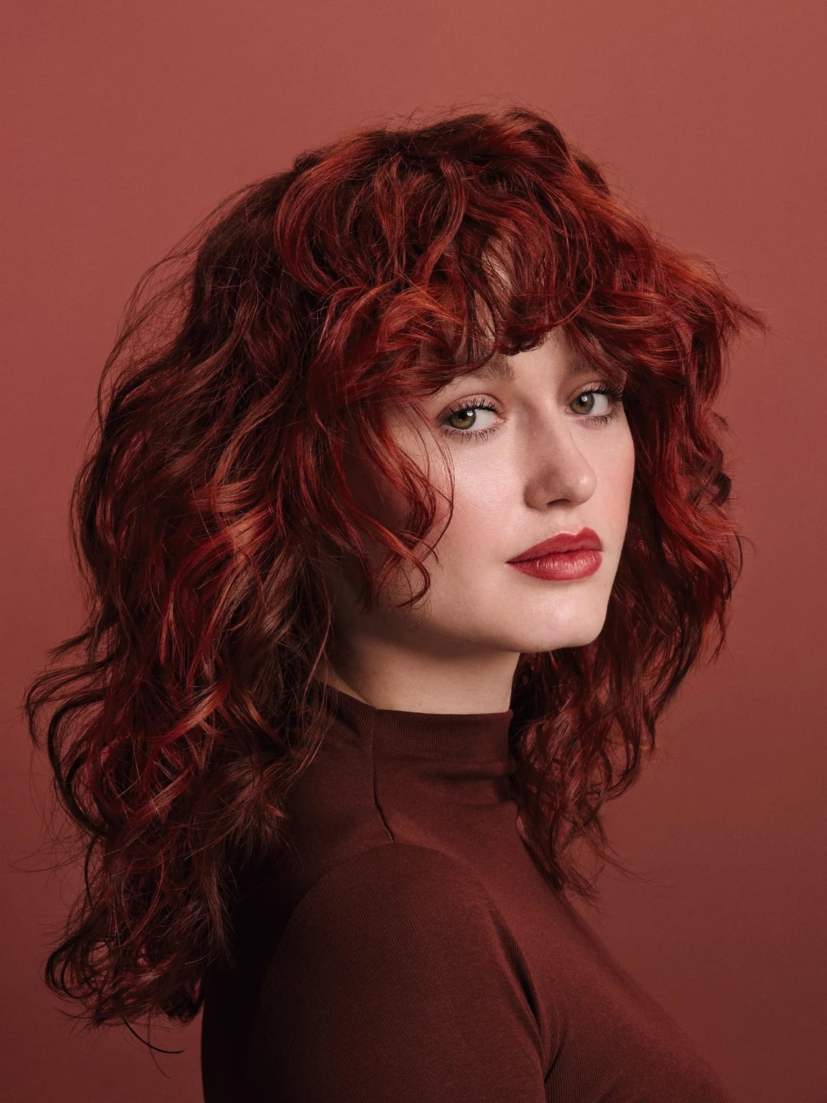 Shoulder Shag With Vibrant Red — Trendy Curly Hair Color