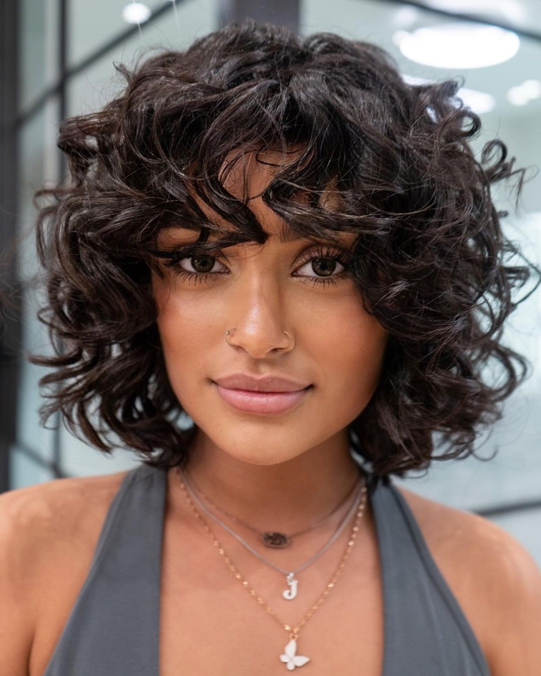 Chin Length Bob With Short Textured Bangs Chin Length Bob With Short Textured Bangs — Trendy Curly Hair Routine