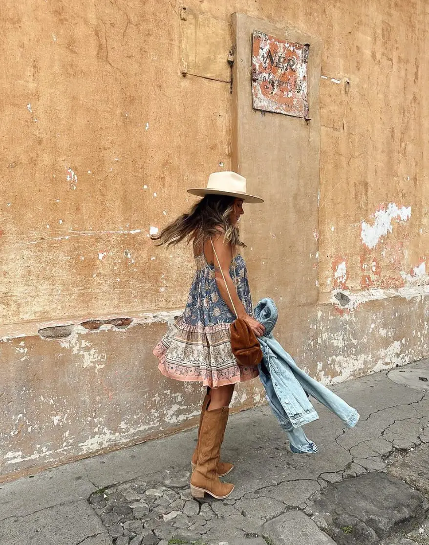 Printed Mini Dress with Denim Jacket and Wide-Brimmed Hat — Trendy Cute Concert Outfit