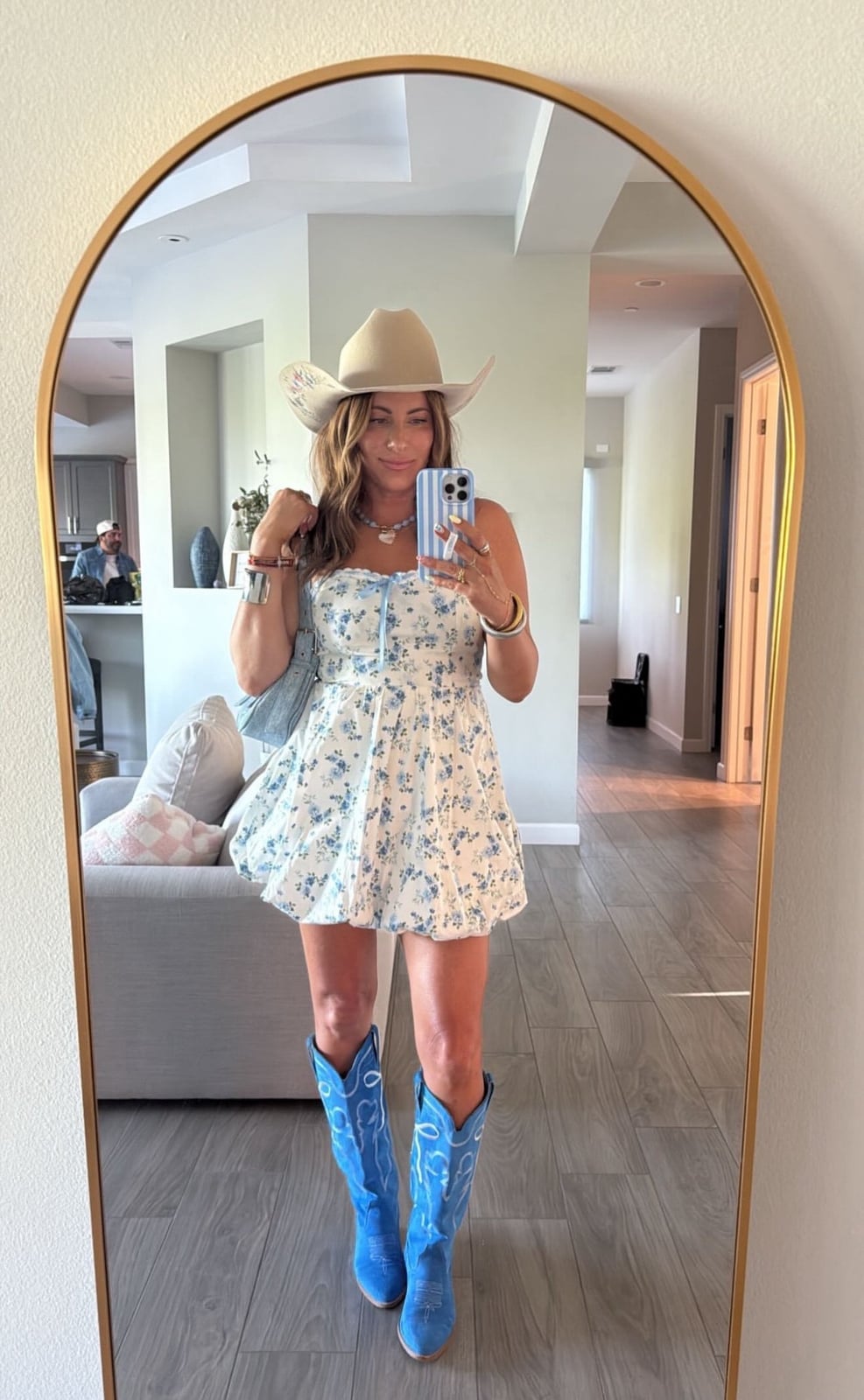 Floral Mini Dress with Denim Jacket and Blue Cowboy Boots — Trendy Cute Concert Outfit