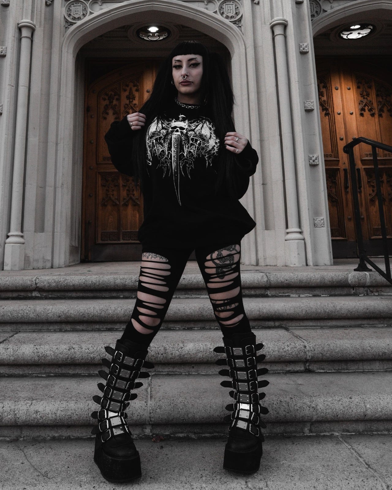 Oversized Graphic Band Tee Over Ripped Leggings and Platform Boots Oversized Graphic Band Tee Over Ripped Leggings and Platform Boots — Trendy Emo Style
