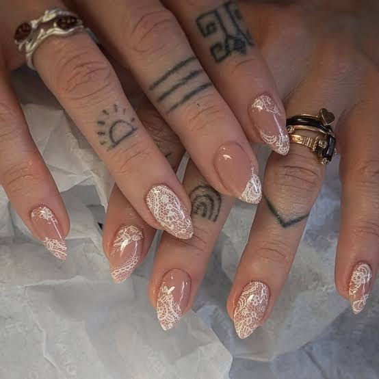 Nude Almond With White Lace Accents Nude Almond With White Lace Accents — Trendy Engagement Nails