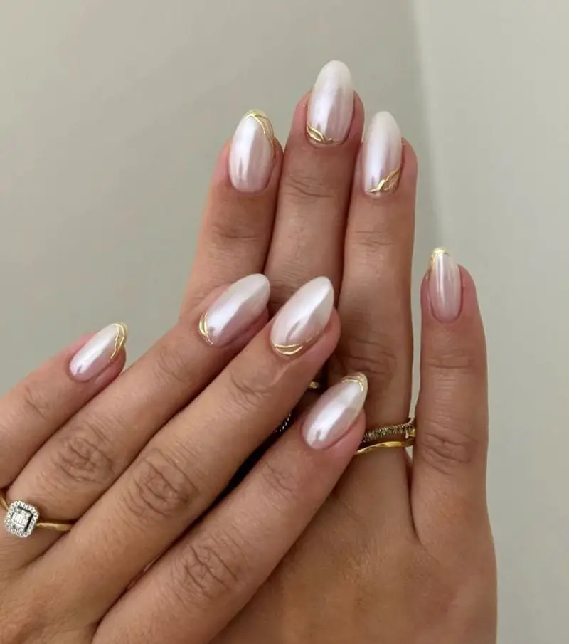 Milky White Pearlescent Almond Gold Accents Milky White Pearlescent Almond Gold Accents — Trendy Engagement Nails