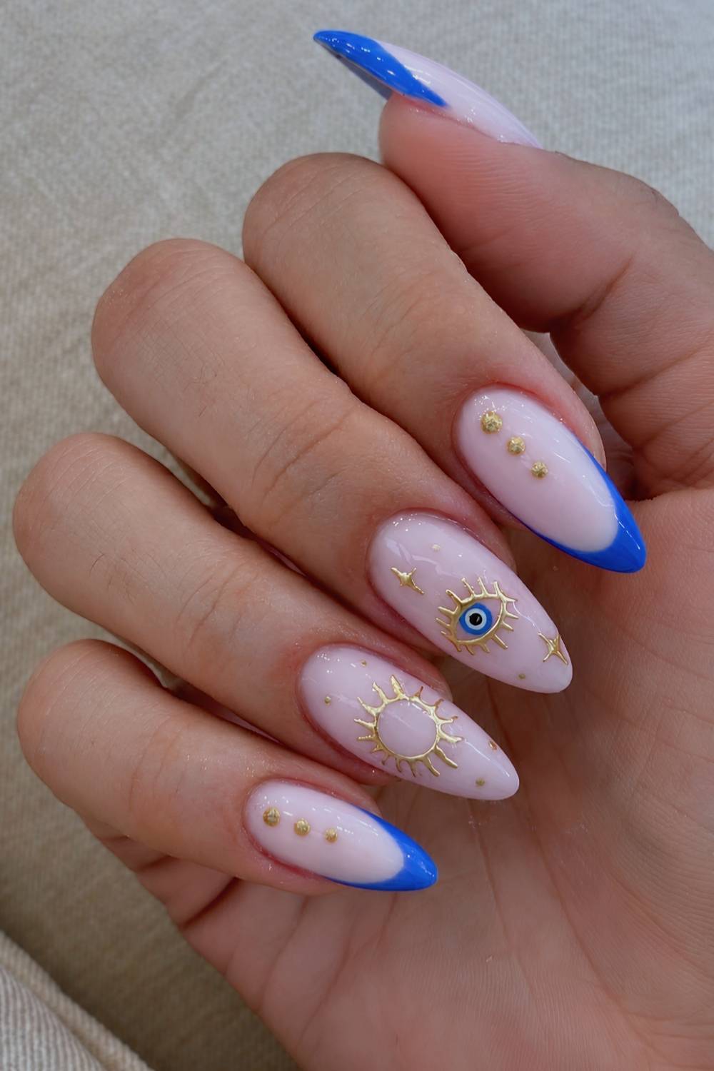 Medium Almond Sheer Pink With Evil Eye Sun Stars — Trendy Evil Eye Nails