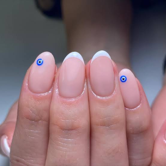 Short Almond Nude Base Delicate Blue And White Evil Eye — Trendy Evil Eye Nails
