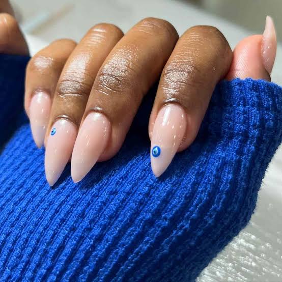 Sheer Milky Pink Long Stiletto Minimalist Evil Eye — Trendy Evil Eye Nails