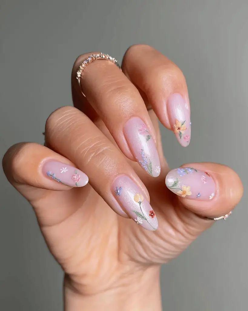 Pearlescent Pink Almond Nails With Pastel Flowers Pearlescent Pink Almond Nails With Pastel Flowers — Trendy Flower Nails