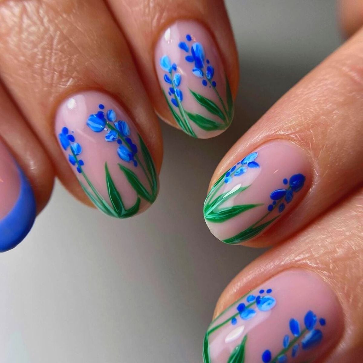 Oval Nails With Hand-Painted Lavender Flowers Oval Nails With Hand-Painted Lavender Flowers — Trendy Flower Nails
