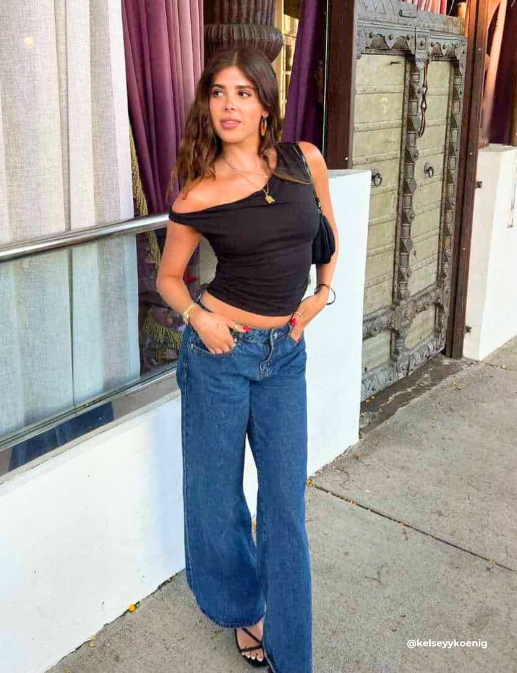 Asymmetrical Top With Wide Leg Jeans and Black Heeled Sandals — Trendy Going Out Outfits