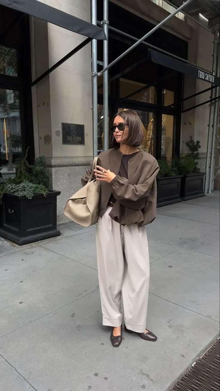 Brown Bomber Jacket With Cream Wide Leg Trousers — Trendy Going Out Outfits