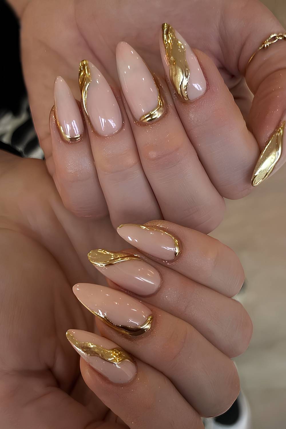 Medium Almond Nails With Liquid Gold Embellishments Medium Almond Nails With Liquid Gold Embellishments — Trendy Gold Nails