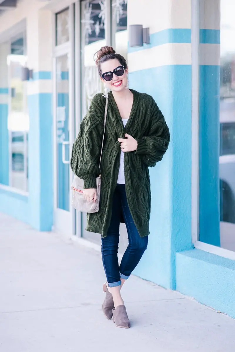 Oversized Olive Green Chunky Knit Cardigan with Jeans, Close-Up Take Oversized Olive Green Chunky Knit Cardigan with Jeans, Close-Up Take — Trendy Green Sweater Outfit
