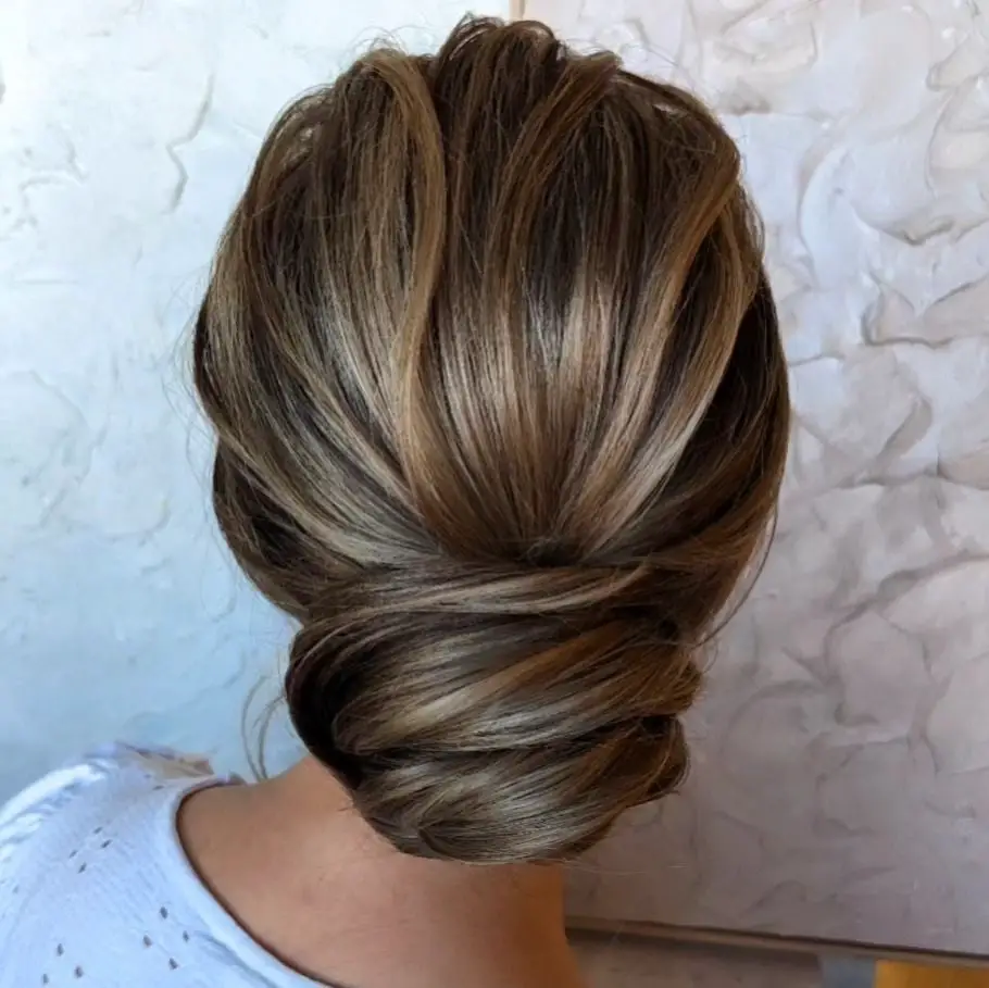Smooth Brown and Blonde Twisted Low Bun Smooth Brown and Blonde Twisted Low Bun — Trendy Hair Up Hairstyles