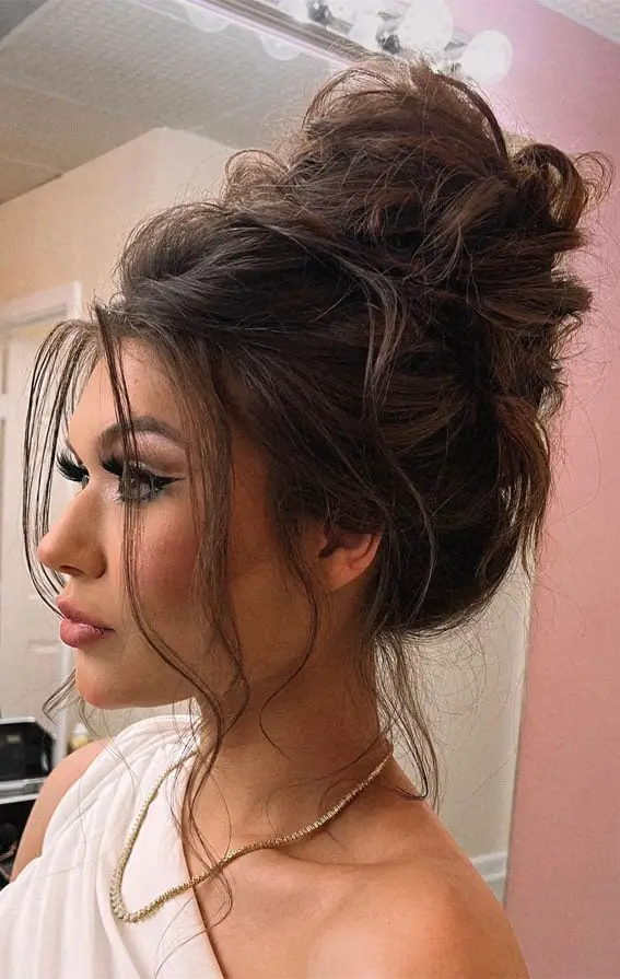 Effortless Dark Brown Messy Bun Effortless Dark Brown Messy Bun — Trendy Hair Up Hairstyles