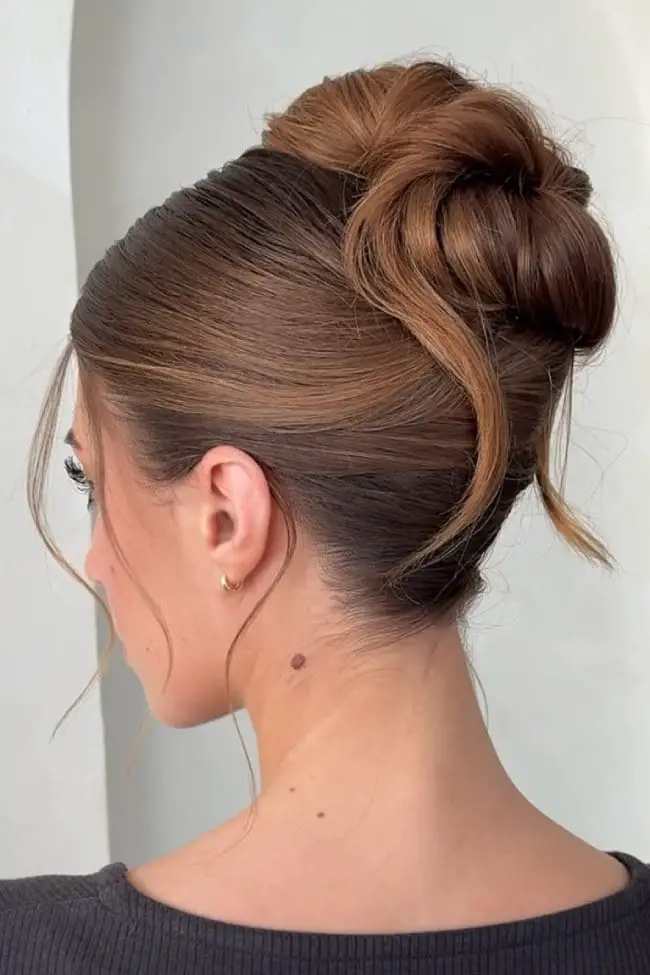 Sleek High Bun with Medium Brown Hair Sleek High Bun with Medium Brown Hair — Trendy Hair Up Hairstyles